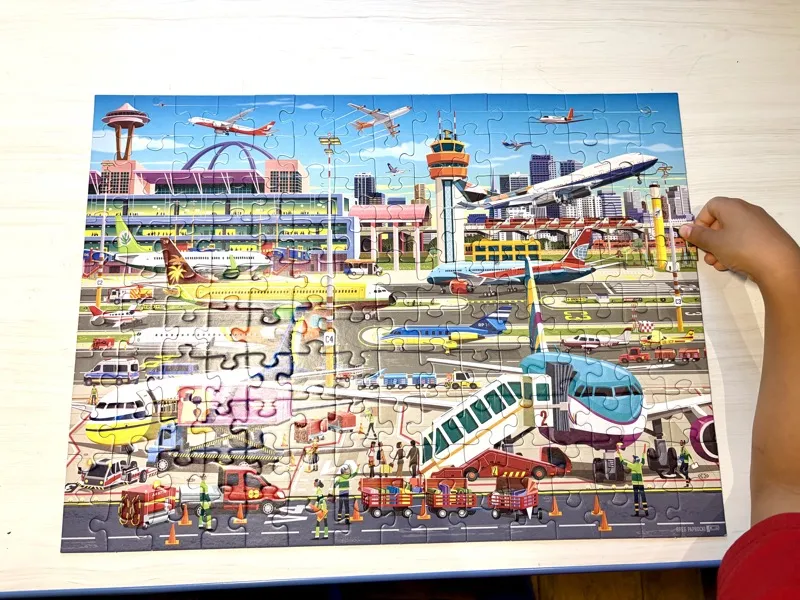Jax working on the Airport Central puzzle