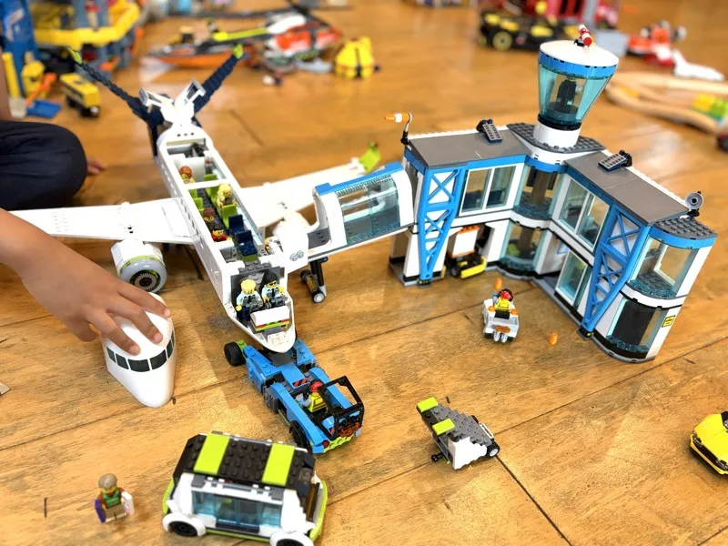 Jax playing with LEGO City Airport 60502